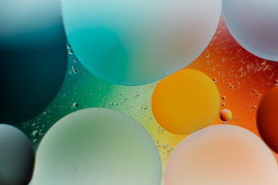 Colorful animated background showing various product icons floating gently.