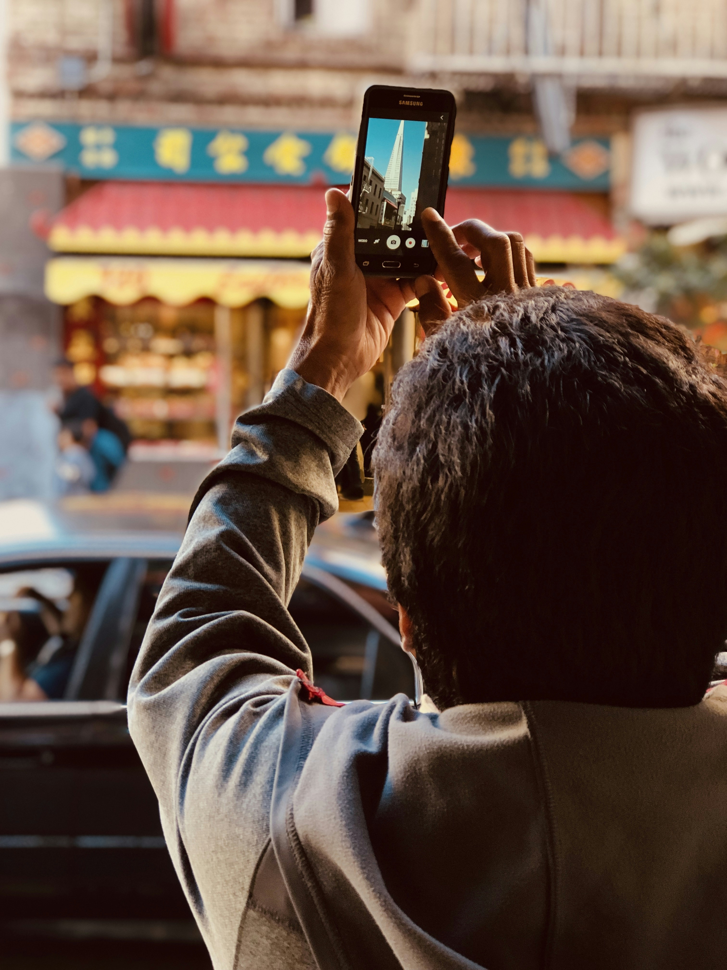 People interacting with a personalized mobile marketing vehicle