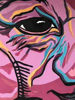 A close-up of a vibrant mixed-media artwork blending paint and digital elements.