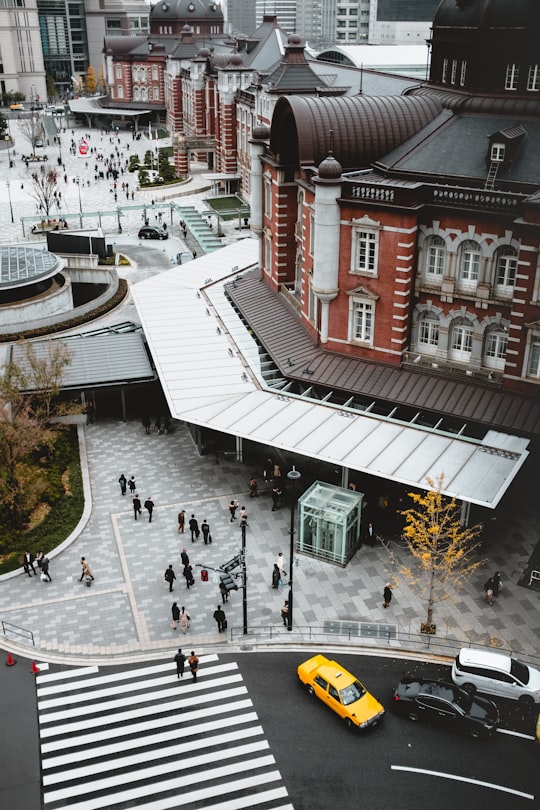 people walking on street near buildings during daytime in KITTE Garden 6floor Japan