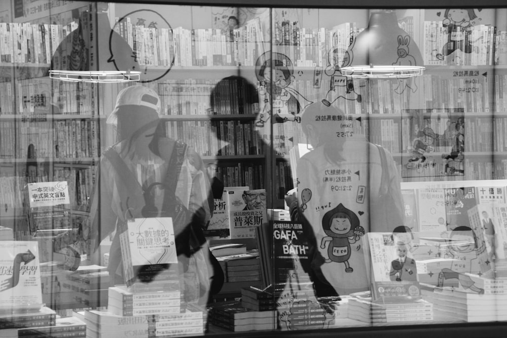 woman in coat standing in front of store