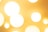 Several glowing round light fixtures are arranged against a warm yellow background, creating an abstract and inviting design.