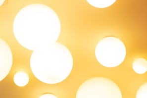 Modern office lobby bathed in warm, inviting light fixtures.