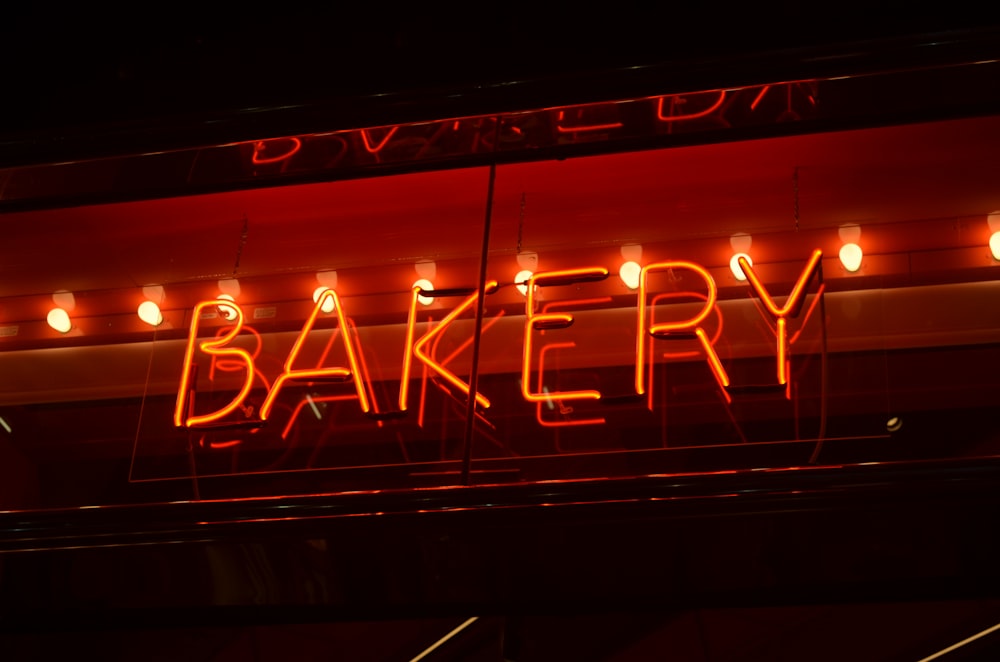 a neon sign that says bakery on it
