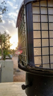 Close-up of a stylish outdoor lamp casting a gentle glow.