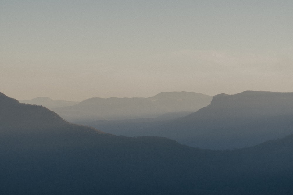 green mountains under white sky during daytime