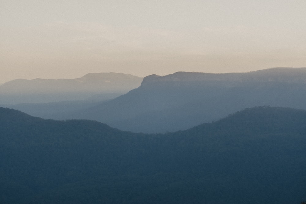 green mountains under white sky during daytime