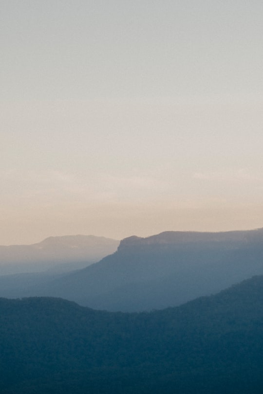 green mountains under white sky during daytime in Blue Mountains NSW Australia