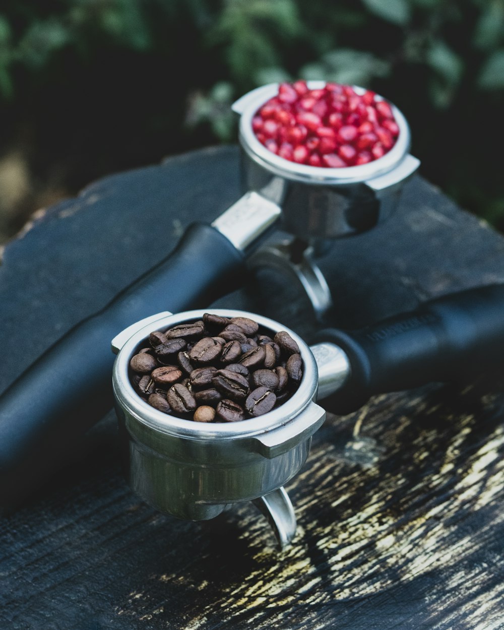 coffee beans in stainless steel cup