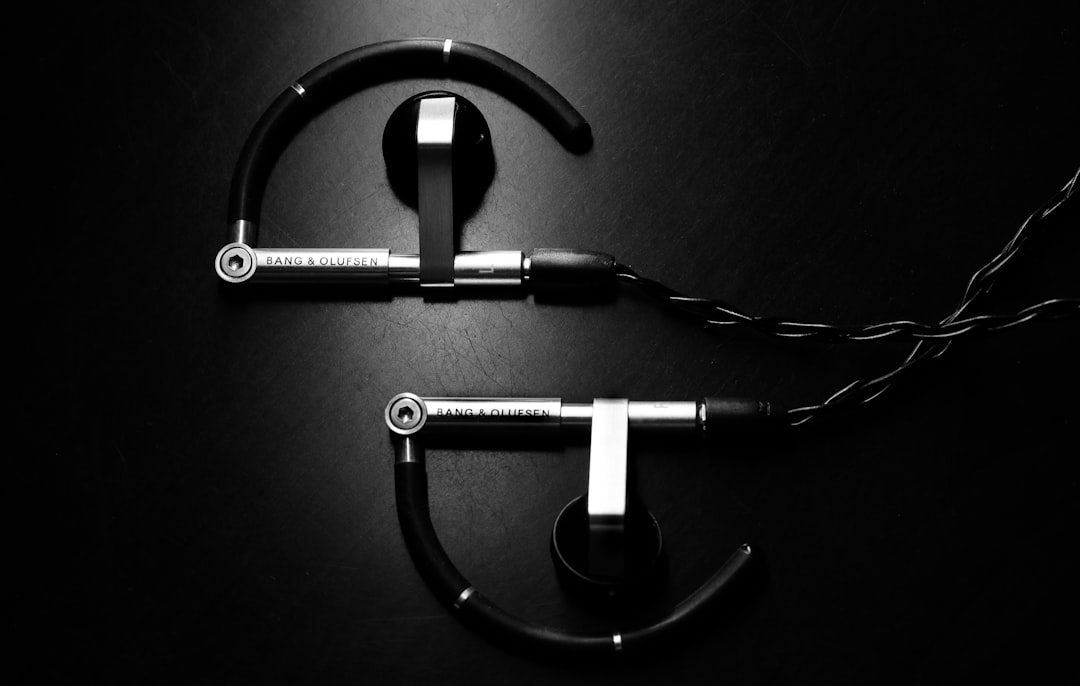 black and white bluetooth earphones