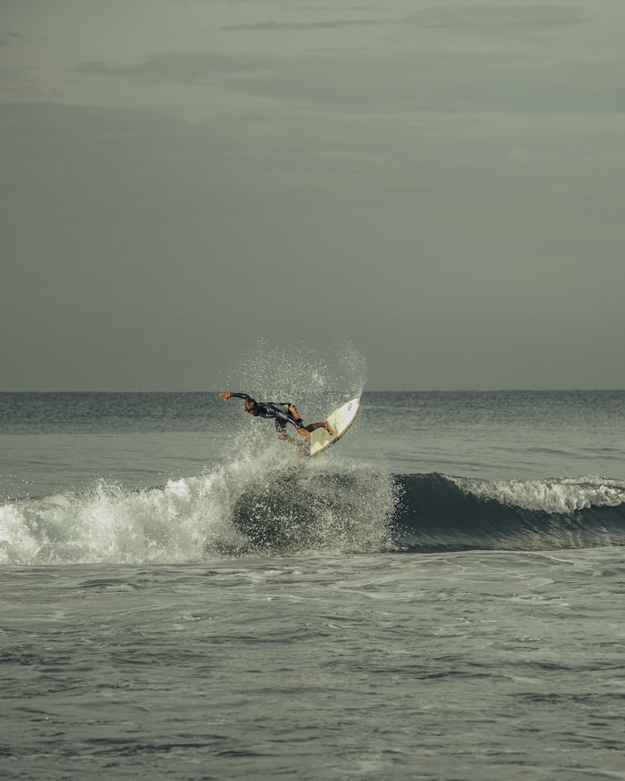 A person surfing in Varkala beach