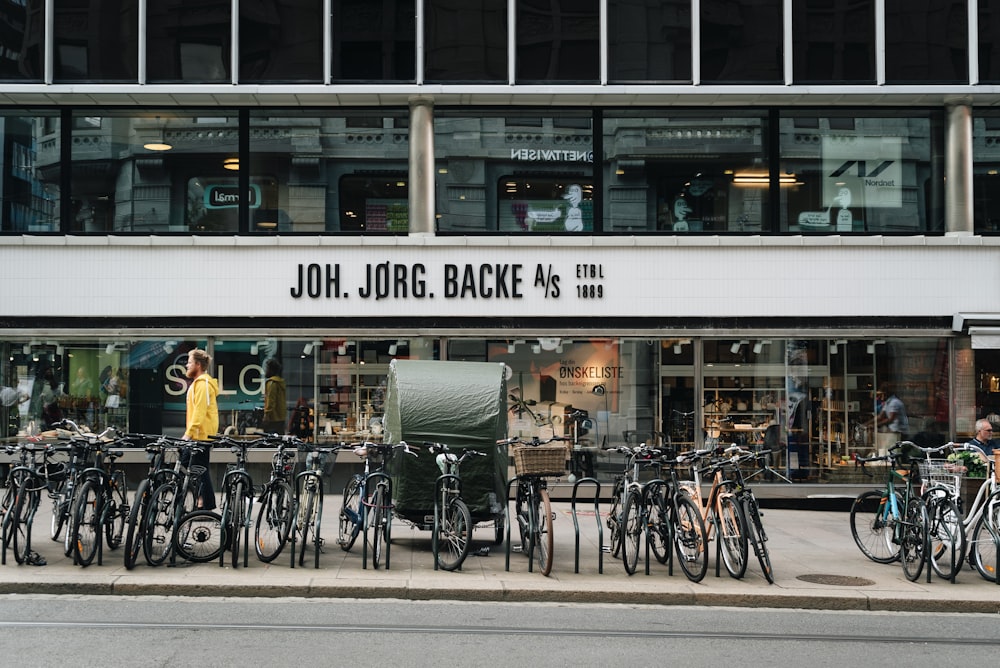 bicycles parked in front of store