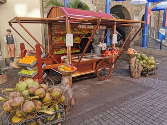 fruits in brown wooden cart