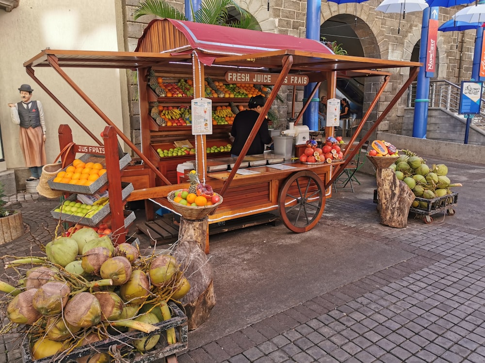 fruits in brown wooden cart