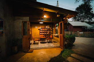 brown wooden store with chairs and tables