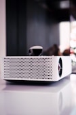 white and black portable speaker