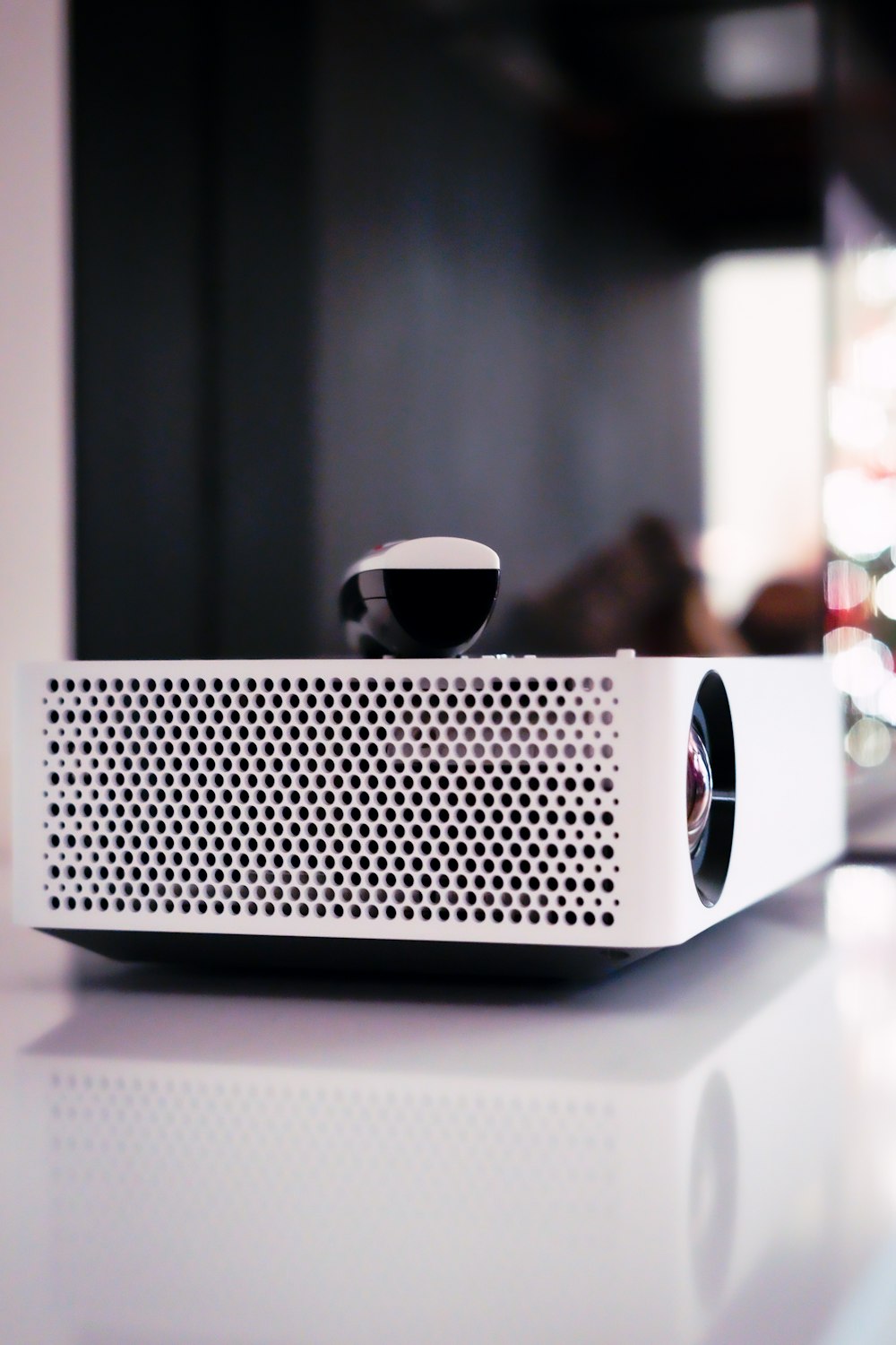 white and black portable speaker