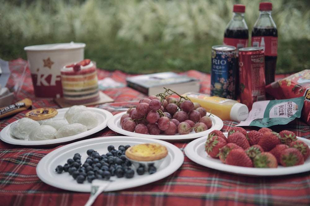 red and white checkered table cloth with fruits on white ceramic plate