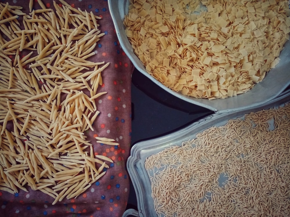 brown rice on stainless steel tray