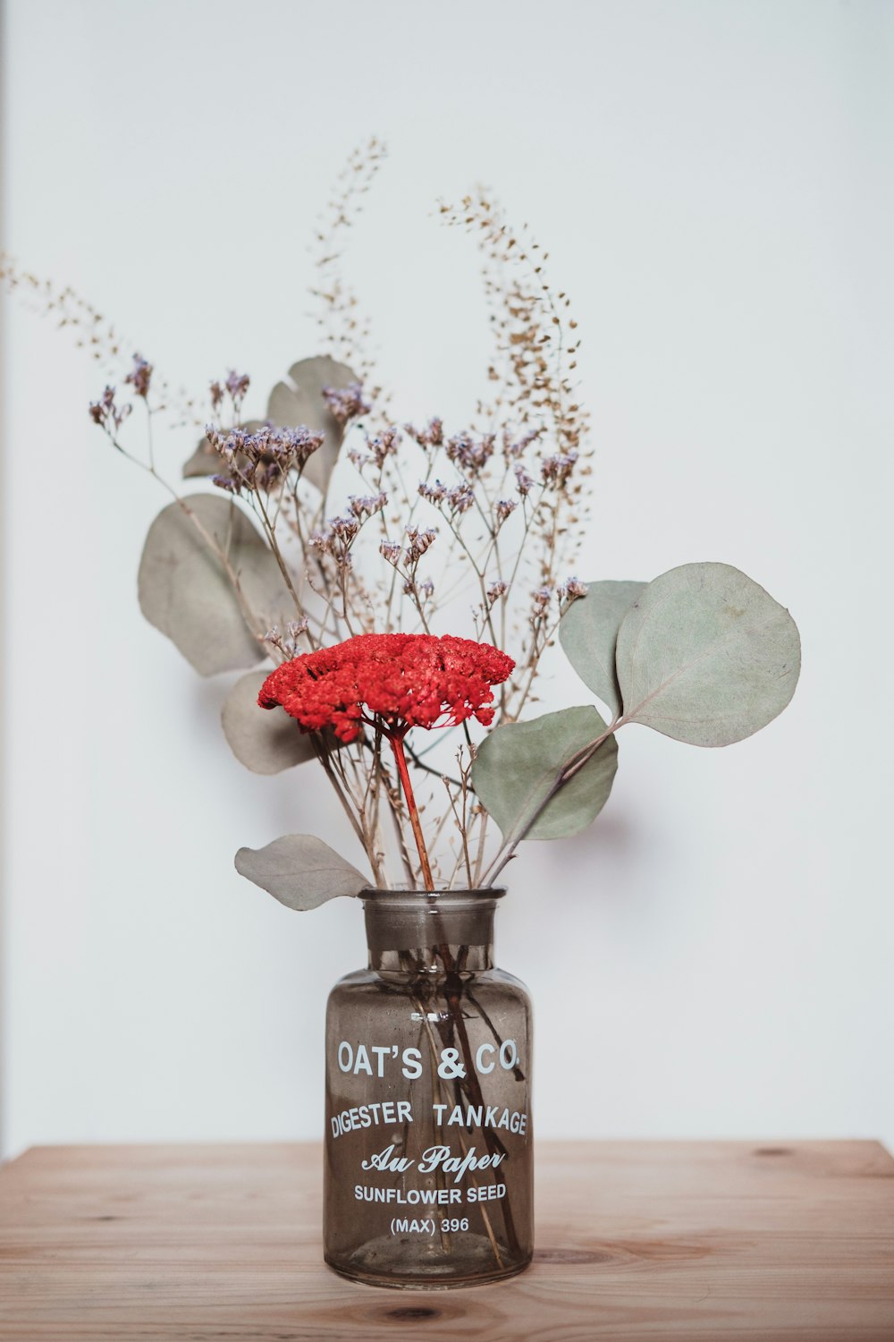 red rose in glass vase