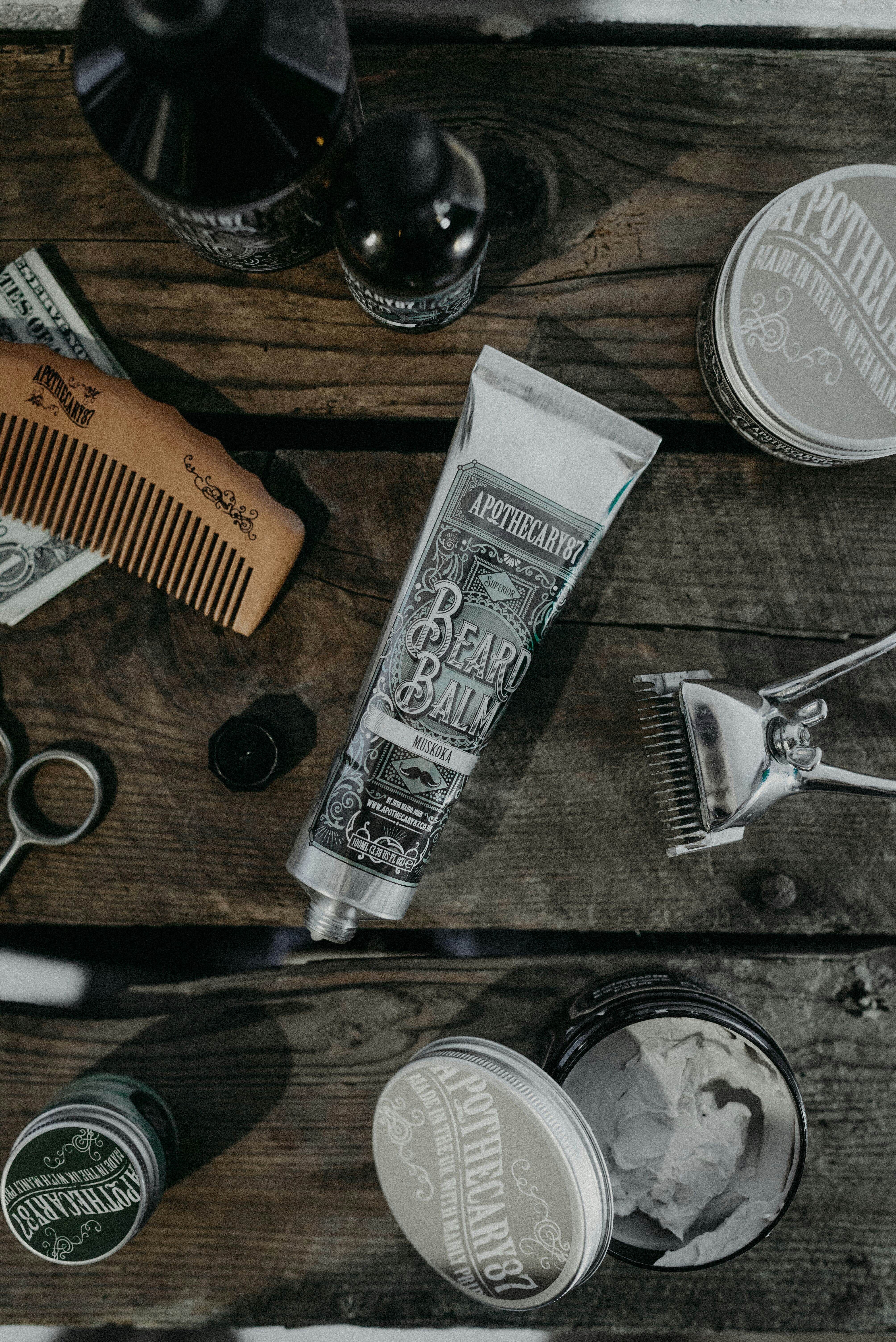 silver key beside white and yellow plastic pack