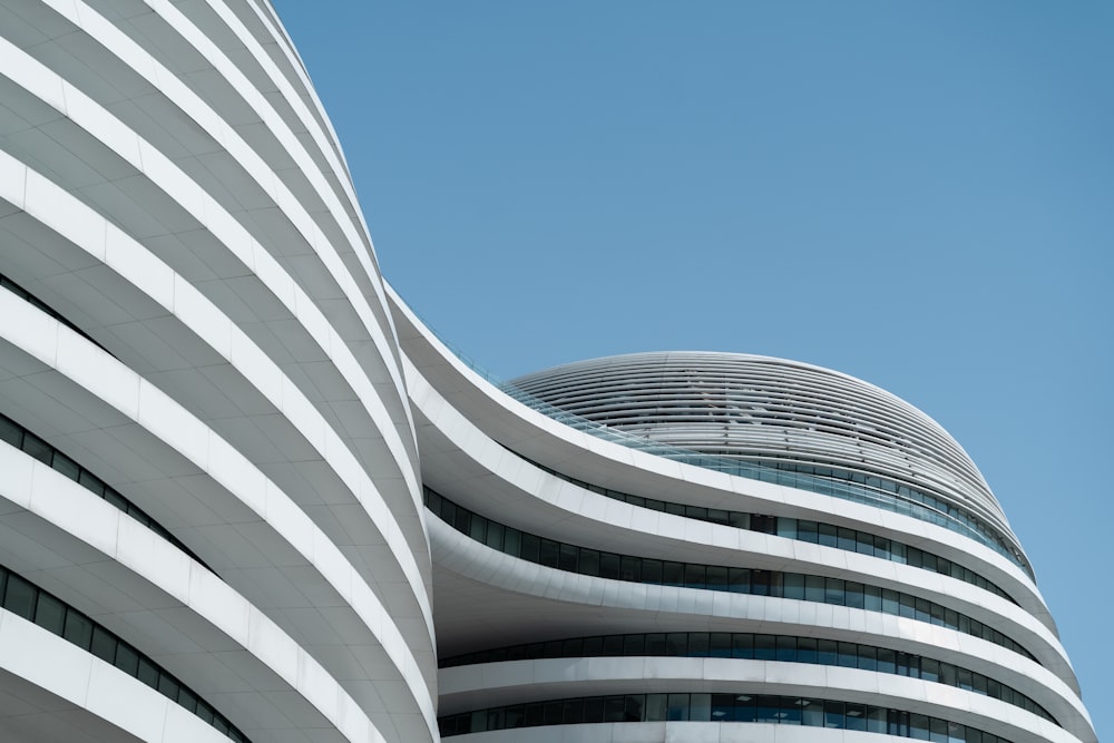 white and black concrete building under blue sky during daytime