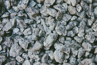 Close-up of crushed basalt stones ready for use in construction projects.