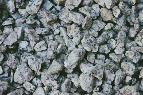 Close-up of crushed basalt stones ready for use in construction projects.
