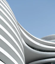 white concrete building under blue sky during daytime
