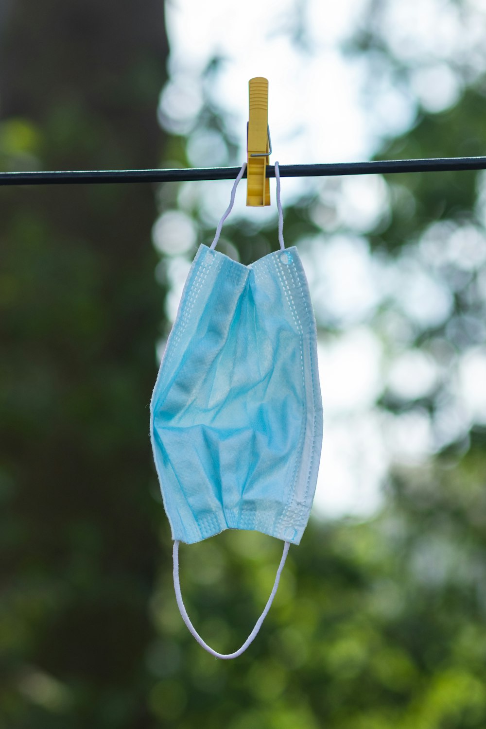 blue panty hanged on clothes hanger