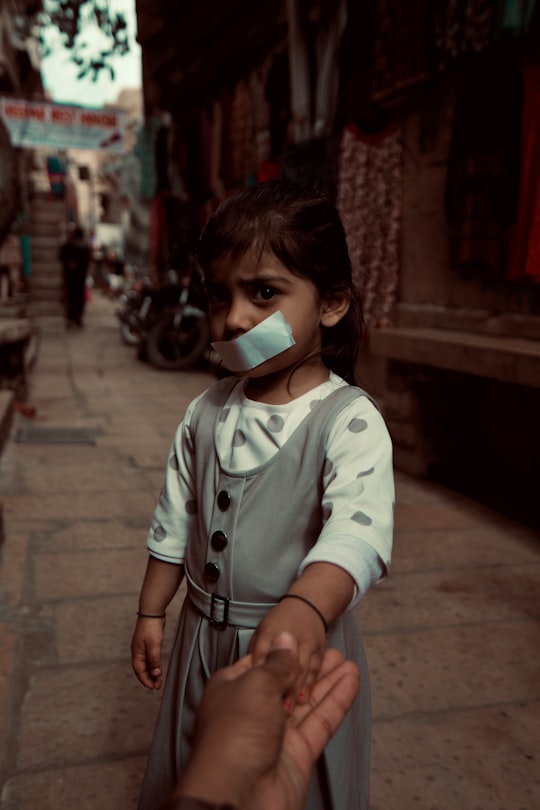 woman in white long sleeve shirt wearing white face mask in Jaisalmer India