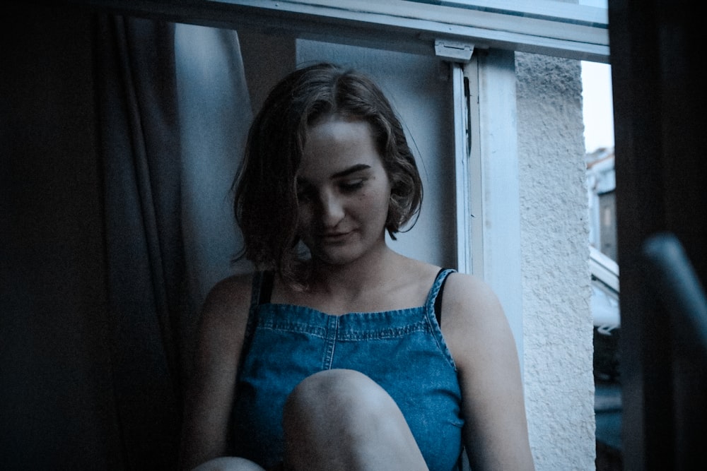 woman in blue tank top