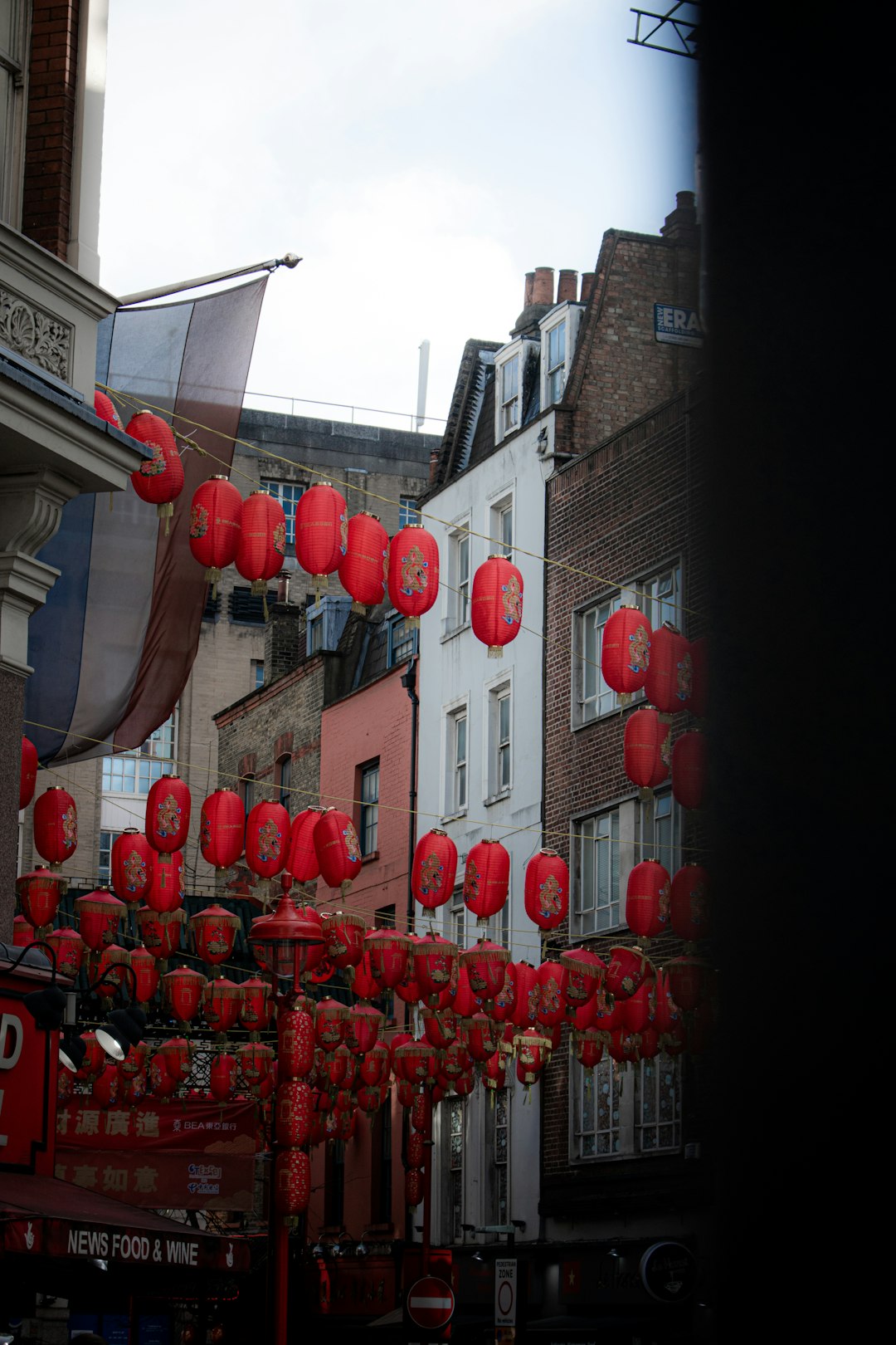 red paper lanterns on street during daytime