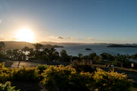 A serene sunset view from a popular travel destination featured in Mandiri Wisata's tour packages.