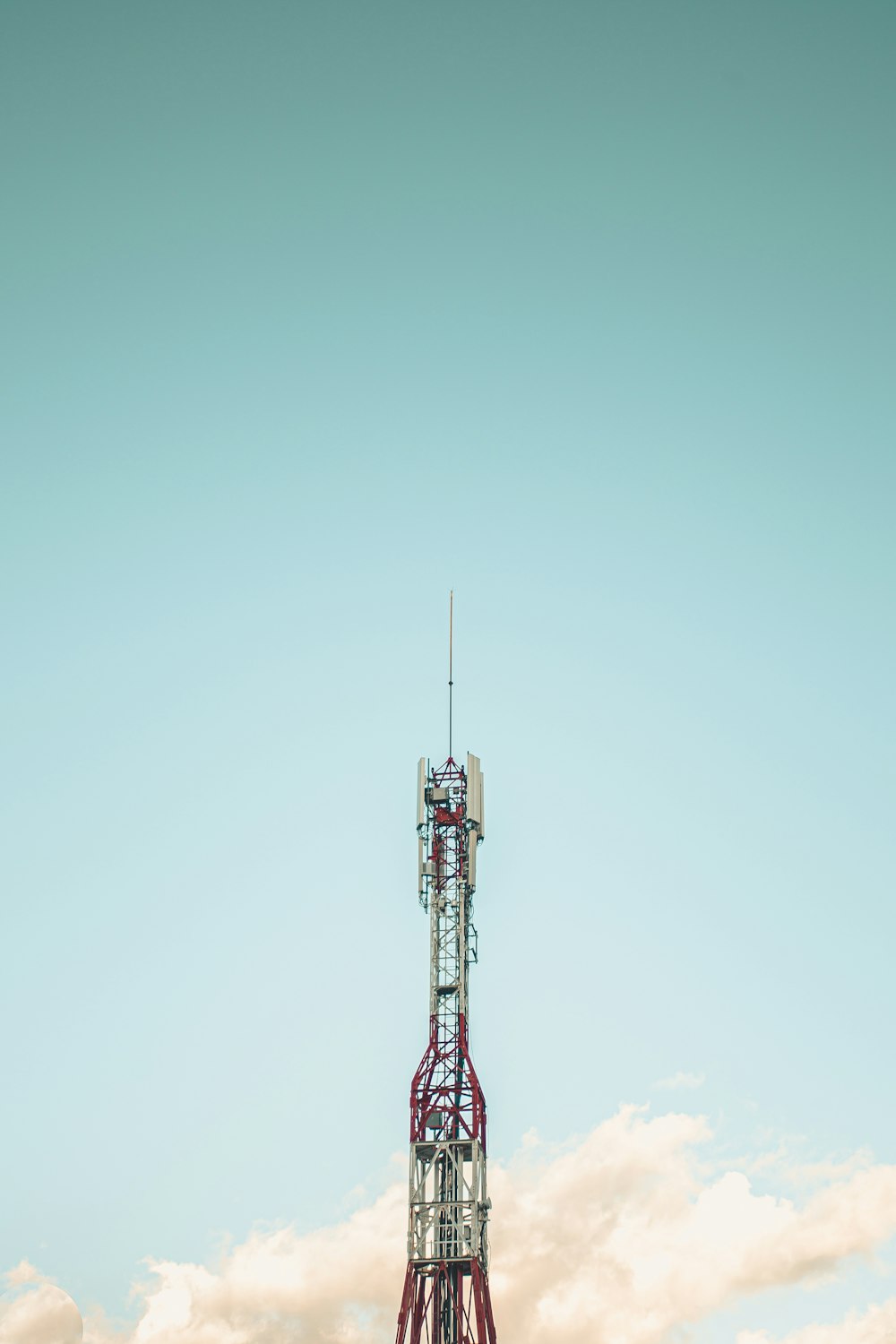 red and white tower under blue sky