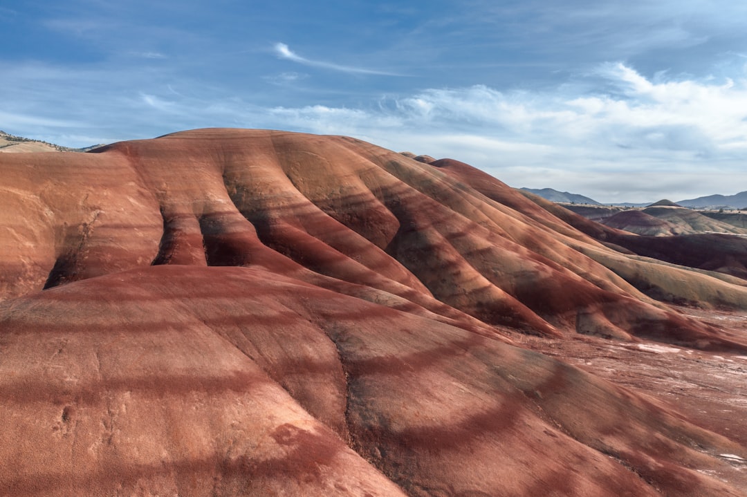 brown rock formation under blue sky during daytime