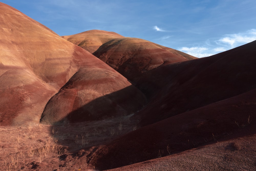 brown mountain under blue sky during daytime