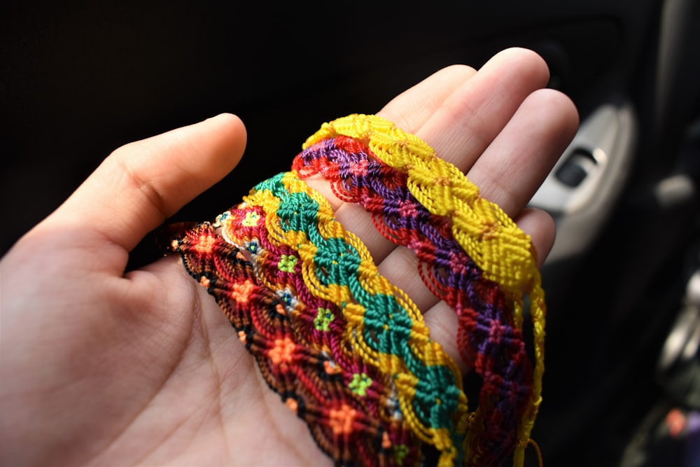 yellow red and green knit textile