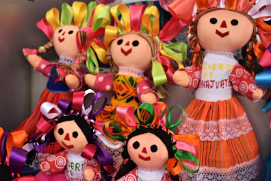 A colorful lineup of pop martl dolls showcasing diverse styles and expressions.
