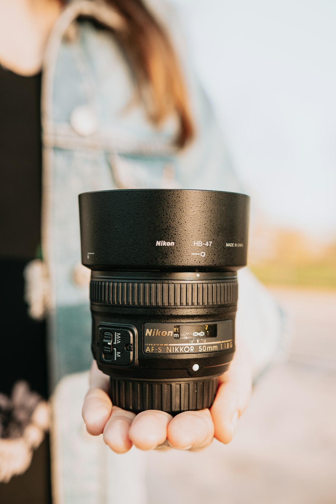 black camera lens on white textile