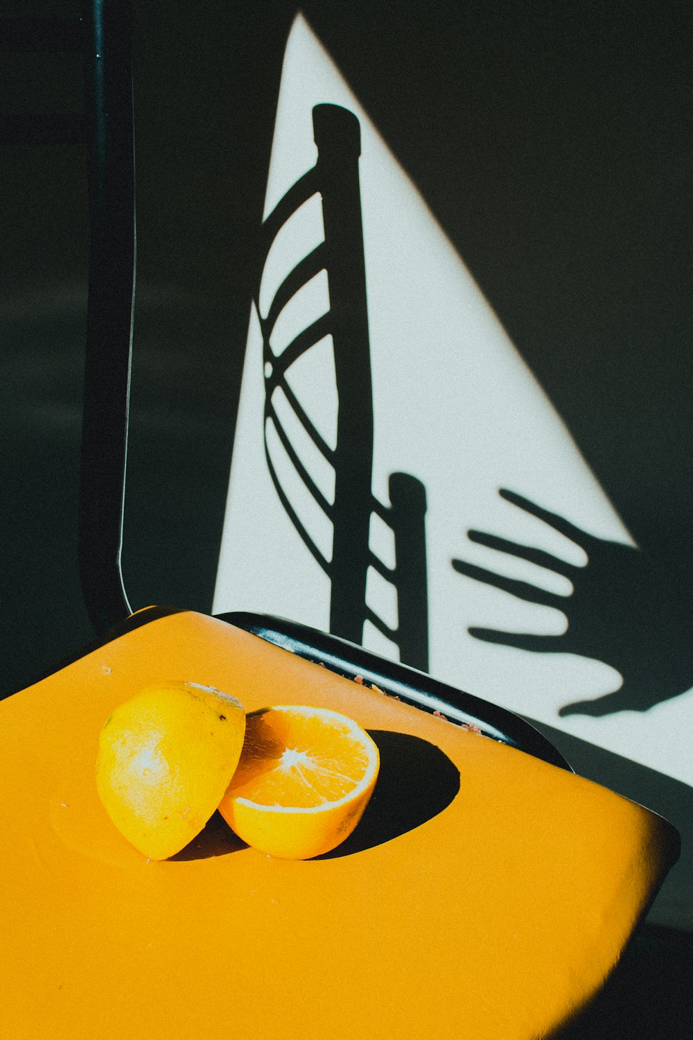 orange fruit on yellow table