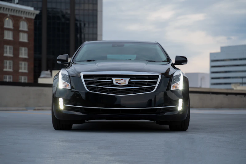 3 Passenger Black Sedan