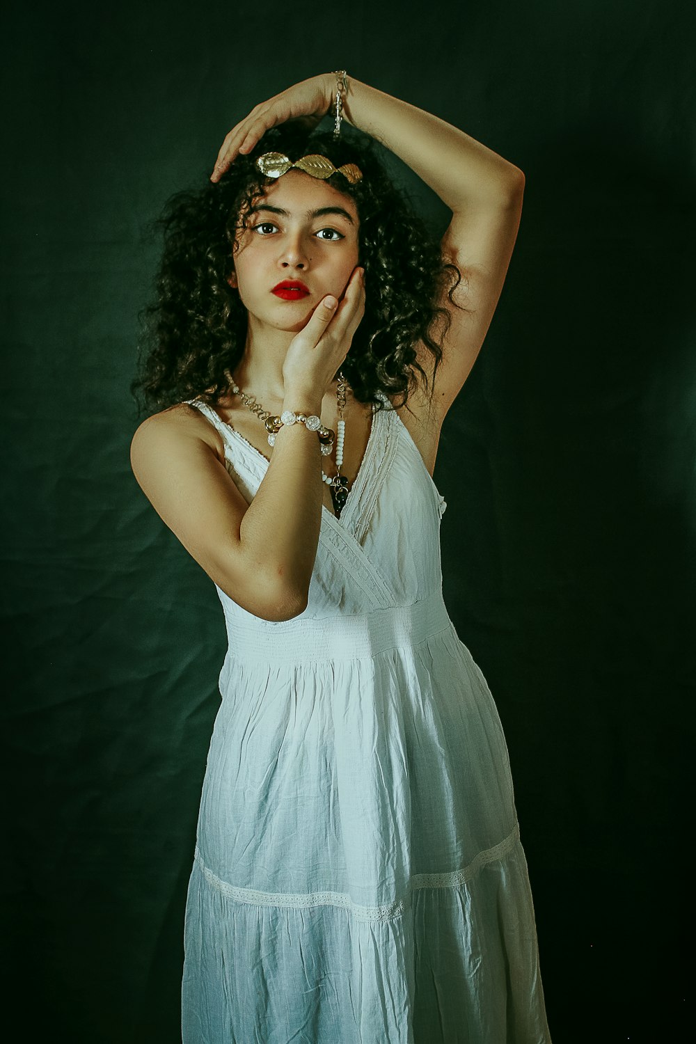 woman in white sleeveless dress