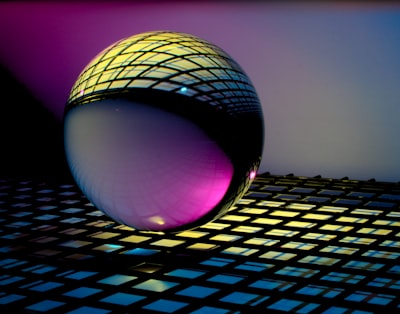 blue and black ball on blue and white checkered textile visual google meet background