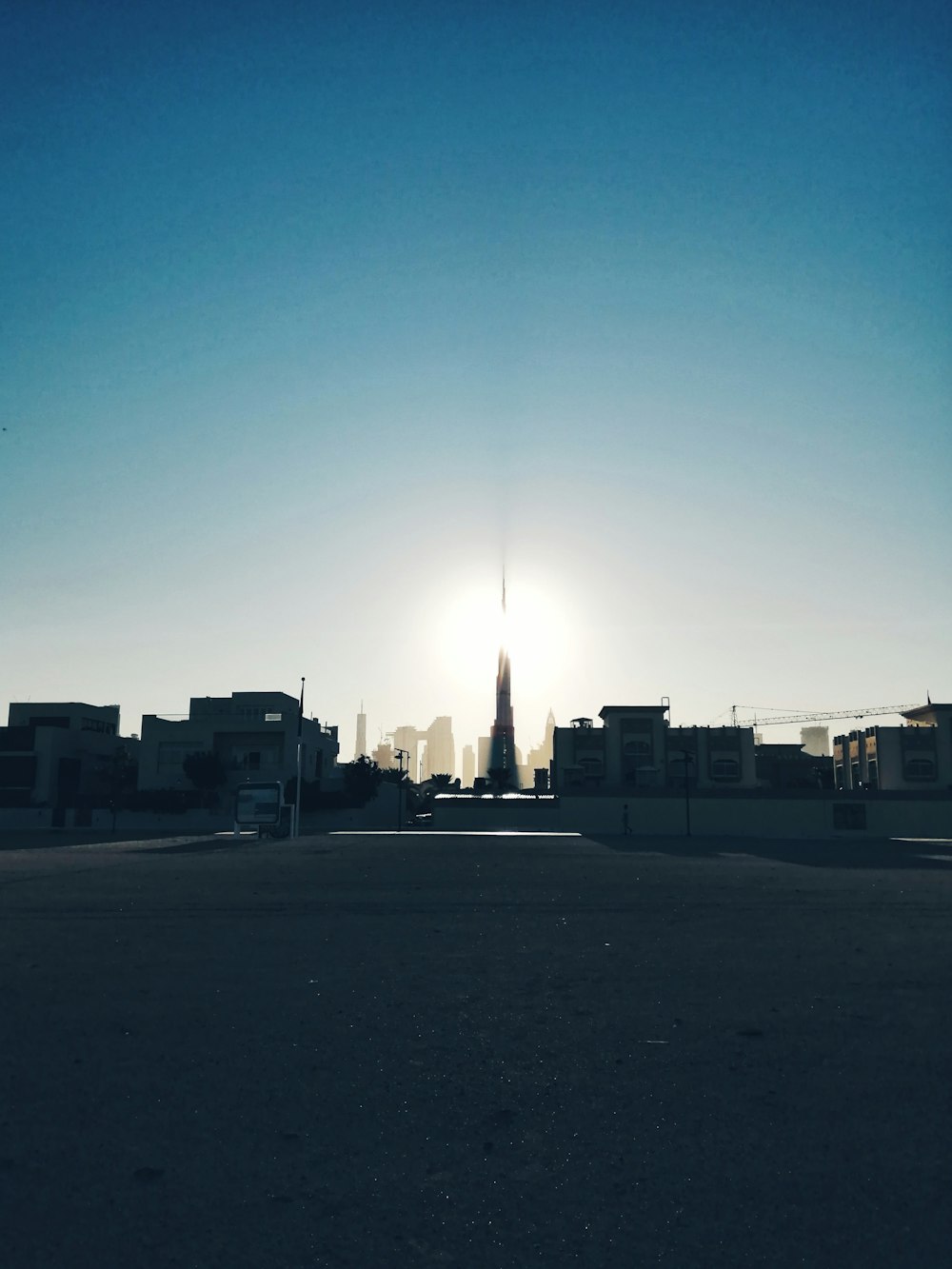 silhouette of buildings during sunset