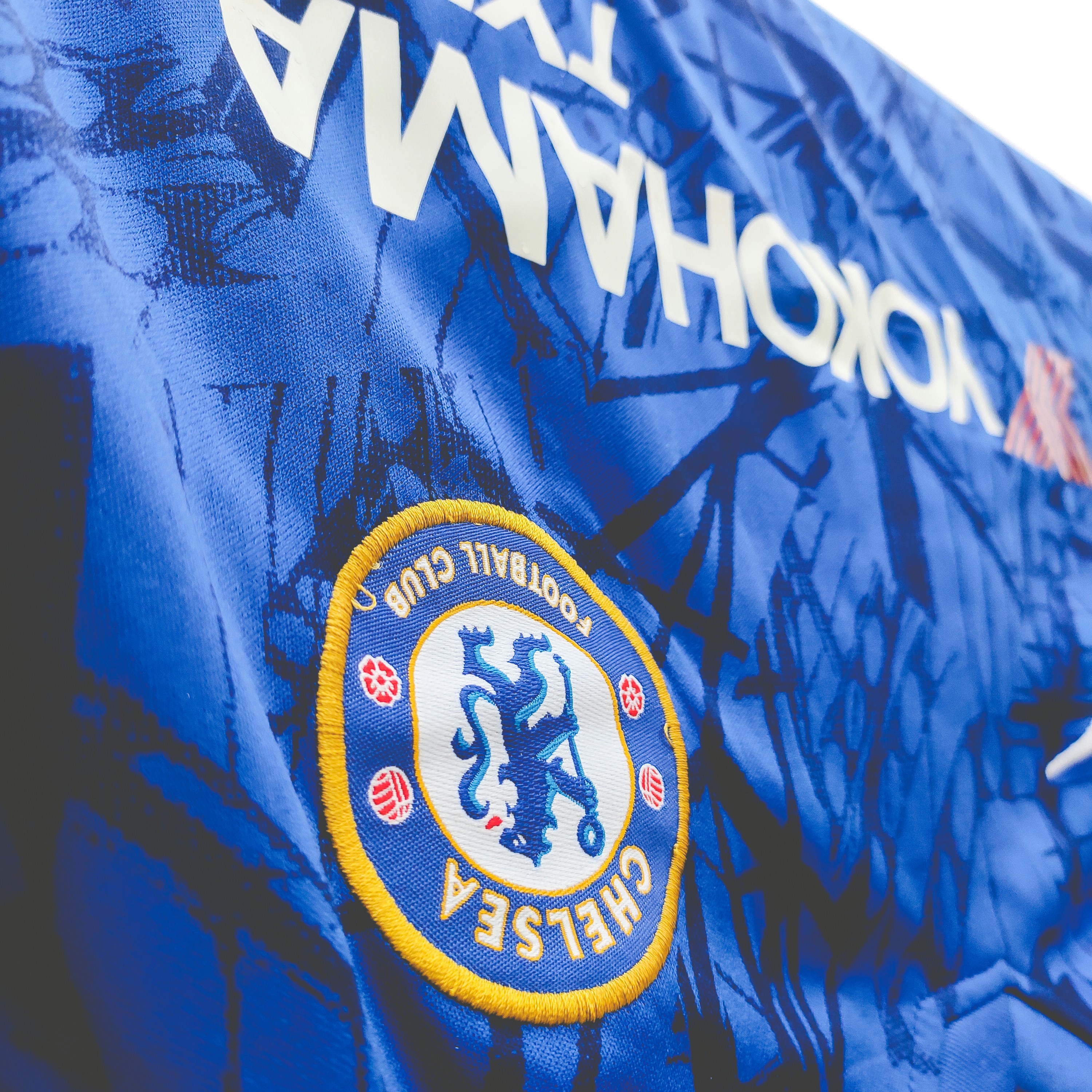 Royal blue football jersey product shot, Chelsea FC home kit, premium sportswear on clean background