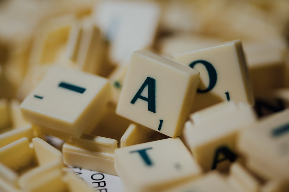 white and black letter t-letter blocks