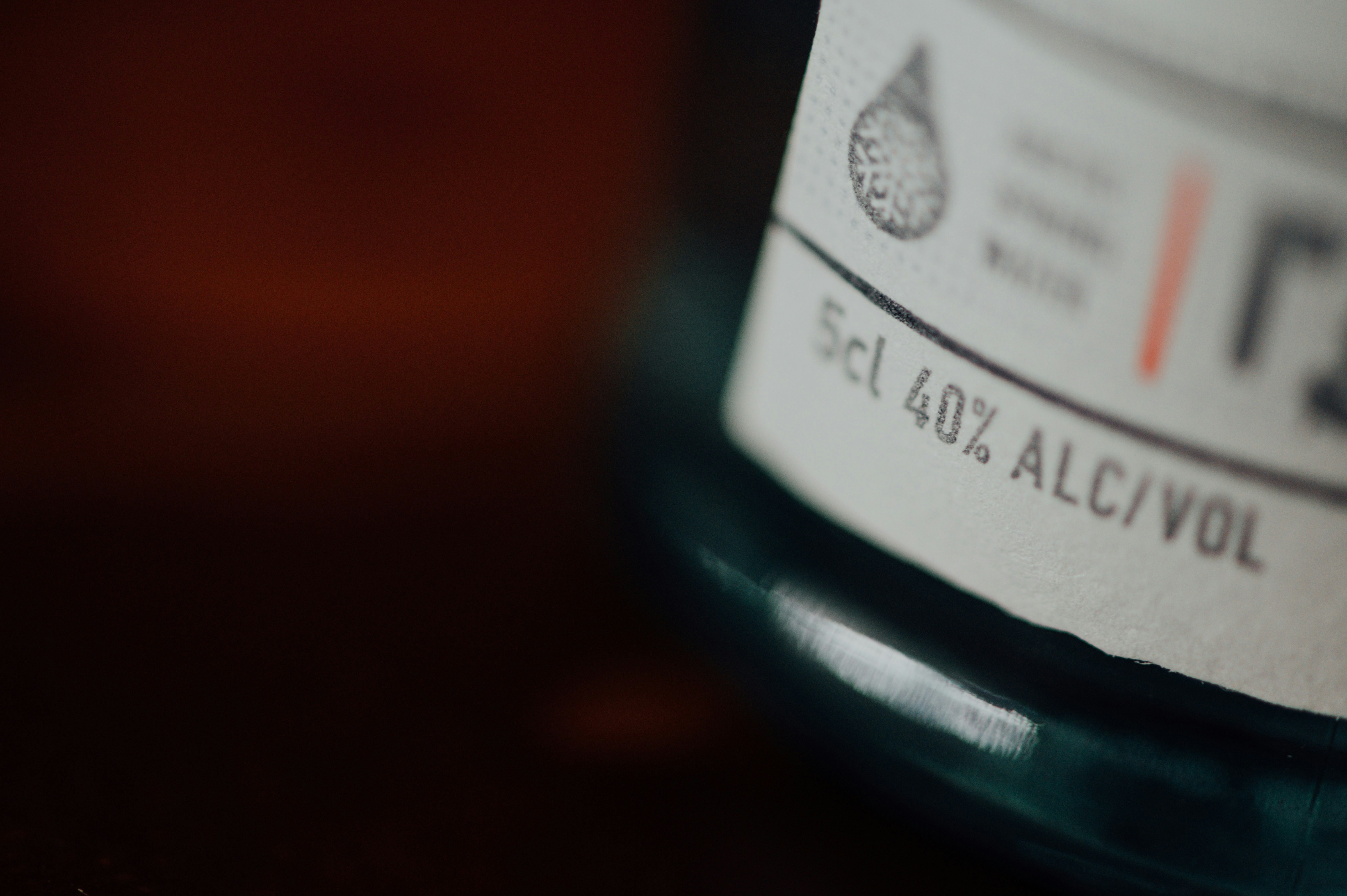 white and black labeled bottle