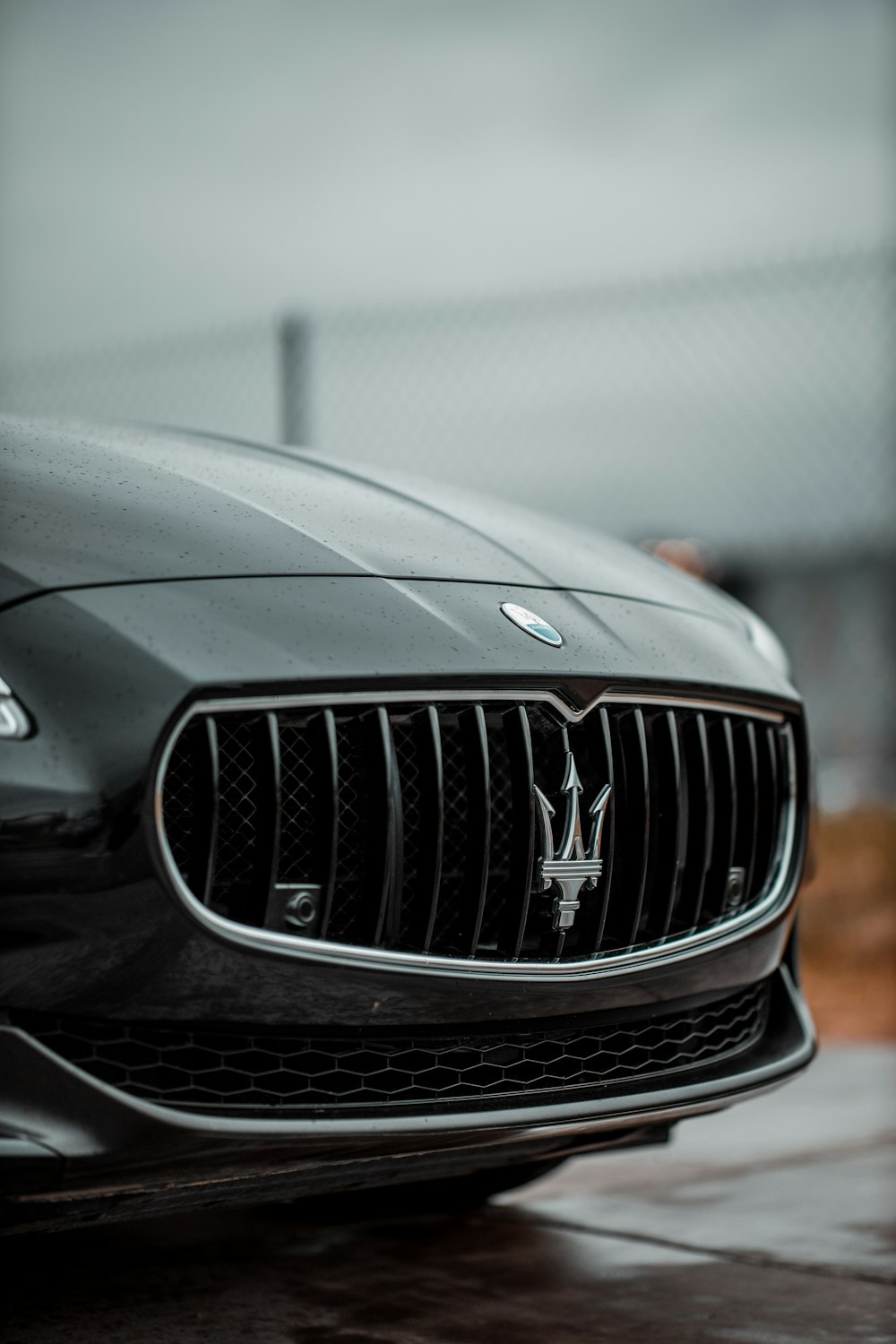 black mercedes benz car in close up photography