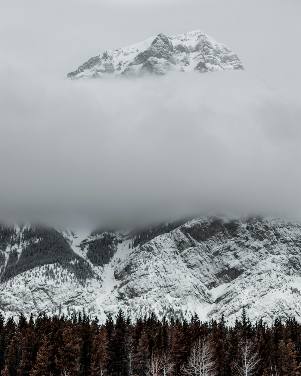 snow covered mountain during daytime